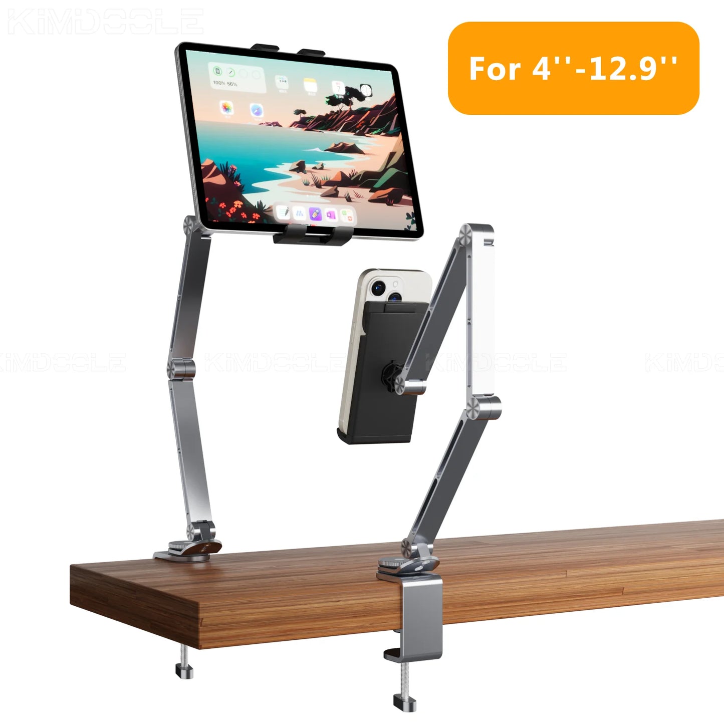 The Artpowers Adjustable Tablet Holder is an elegant, wooden-mounted stand with separate arms for a tablet and phone. Its universal design, marked by an orange label, supports devices from 4 to 12.9 inches effortlessly.