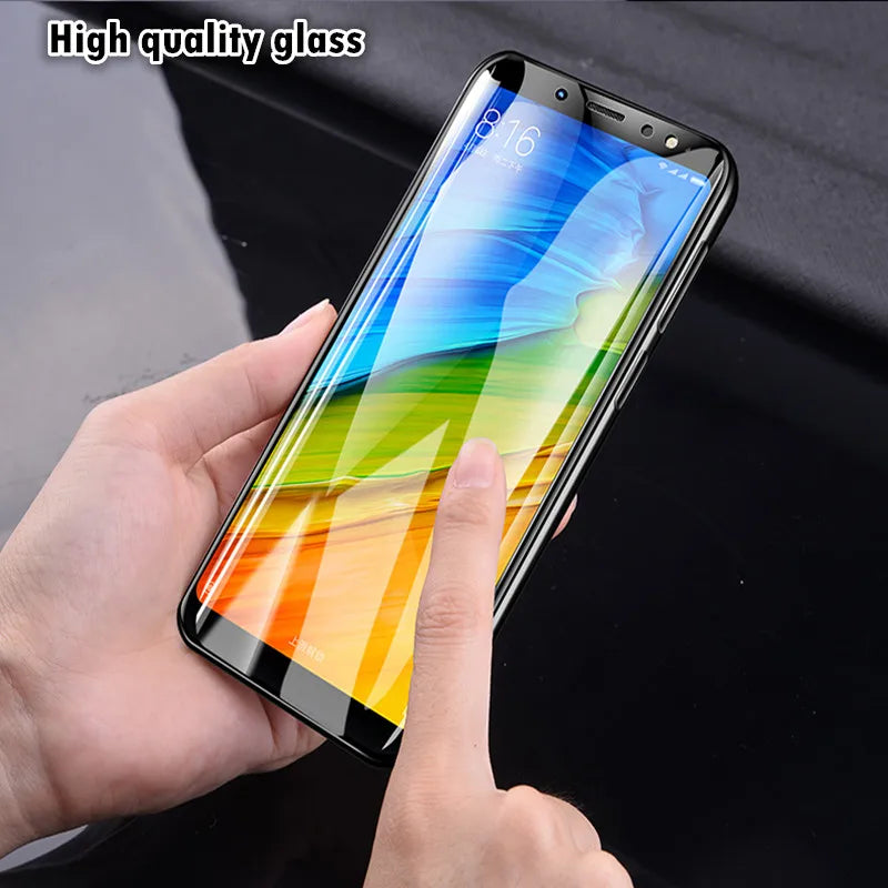 A person holds a smartphone with a colorful display of blue, green, yellow, and red hues, featuring the LITBOY Tempered Glass Protector for Xiaomi Devices. High quality glass on Xiaomi devices is displayed in the top left corner.