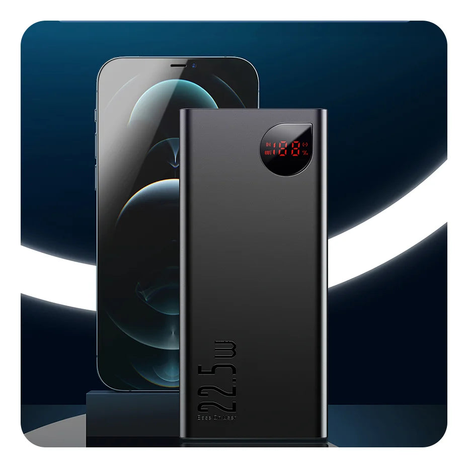 Against a dimly lit backdrop, a sleek black smartphone pairs with the Baseus 10000mAh Power Bank featuring a digital display. This power bank offers 22.5 W fast charging, making on-the-go refueling quick and easy.