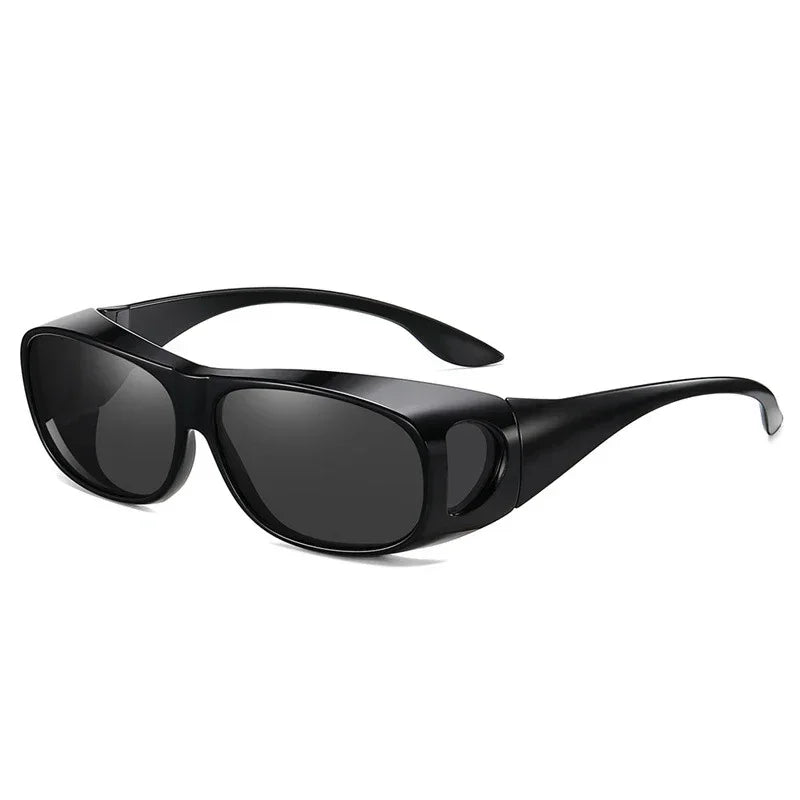 The MOKDUFF Polarized Sunglasses offer a sleek black wraparound design with wide arms and polarized lenses, providing UV400 protection for full eye coverage and a modern look.