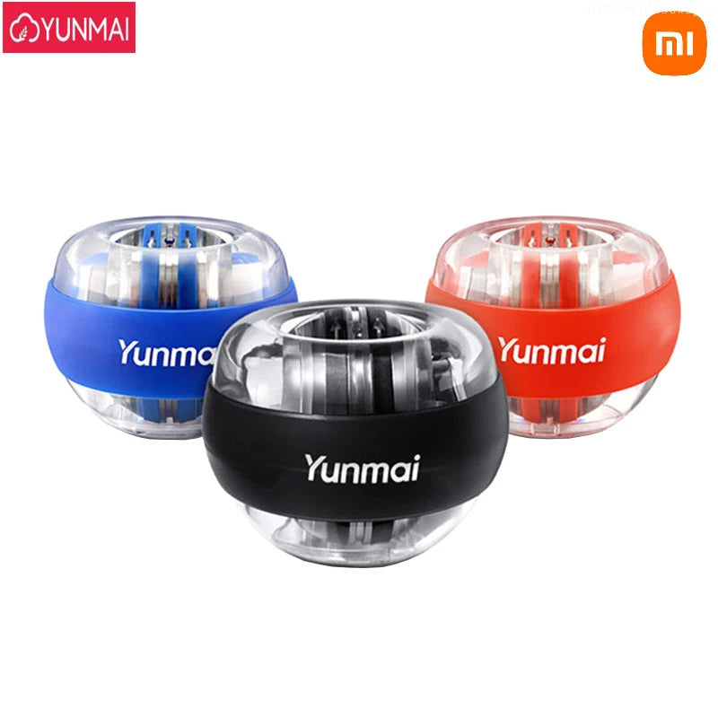Three Xiaomi Forearm Exerciser LED Gyroball Trainers in blue, black, and red with branding are displayed on a white background. These grip strength enhancers have a transparent shell showing internal mechanics and feature YUNMAI and MI logos in the corners.