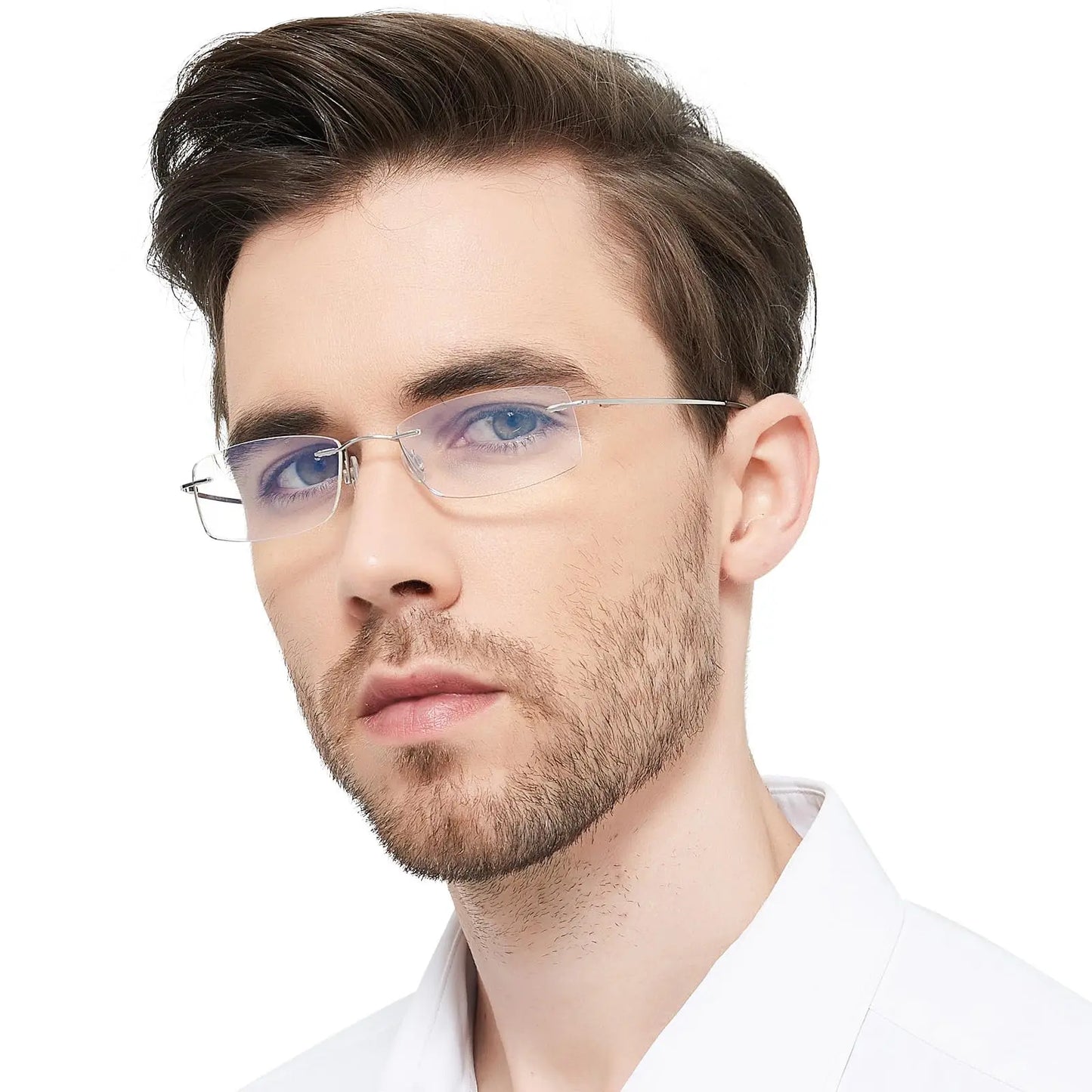 A man with short brown hair, a beard, and glasses from the YINSQER Titanium Rimless Reading Glasses collection is wearing a white collared shirt. He looks directly at the camera against a plain white background, conveying style and sophistication while featuring blue light blocking technology.
