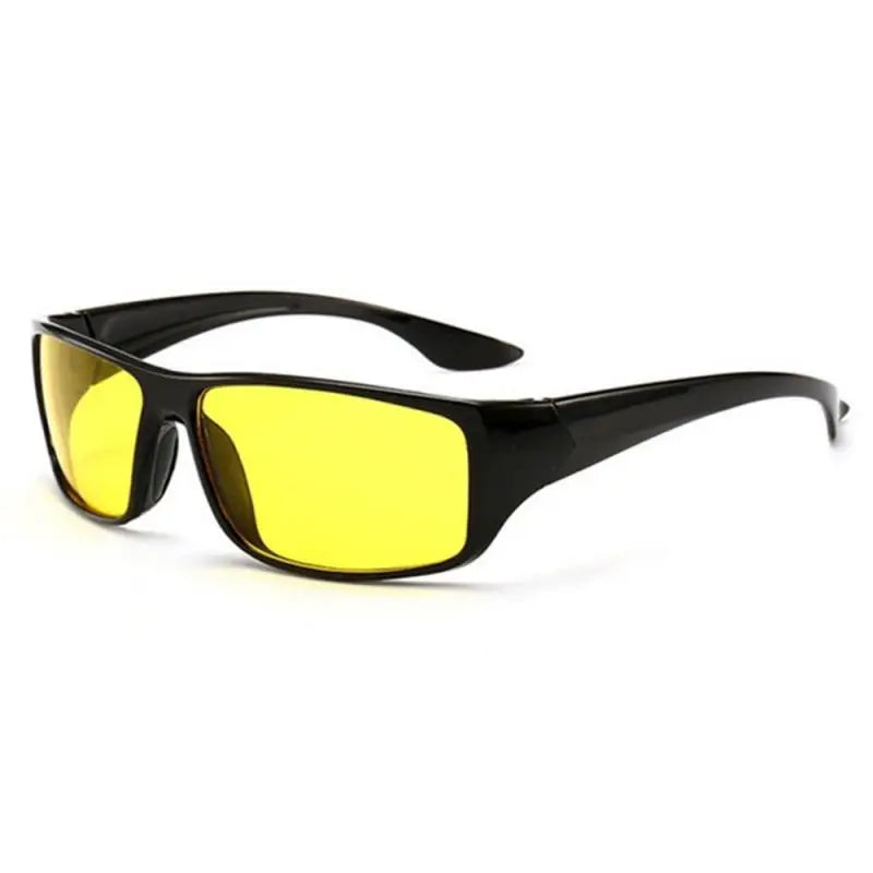 The Anti-Glare Night Vision Goggles offer clear visibility with UV400 protection. Designed in a sporty wraparound style, they rest elegantly on a plain white background, making them perfect for sunny days and eye safety.