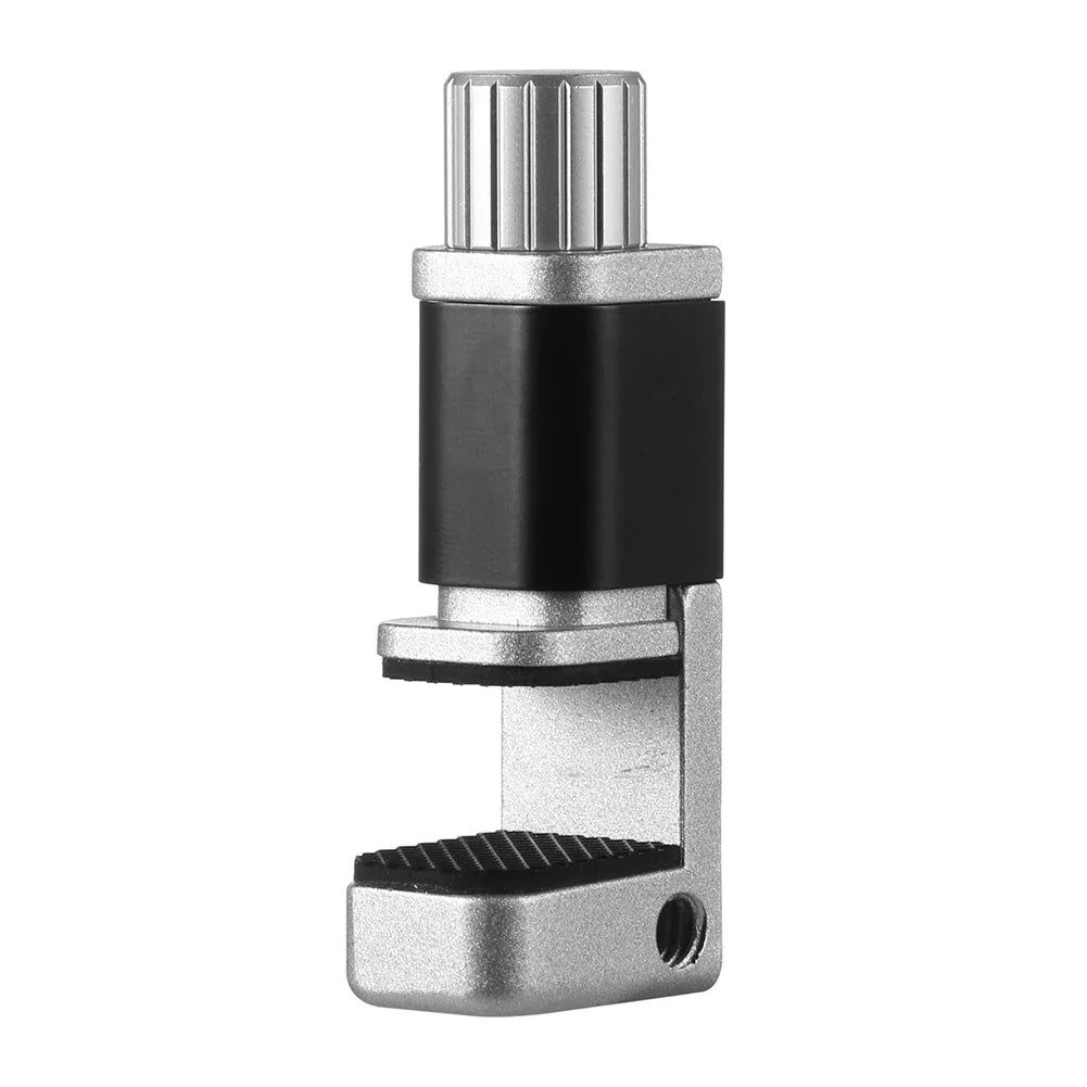The MOJOYCE Adjustable Alloy Clamp for Secure Mobile Repairs includes a ribbed gripping surface and adjustable screw knob, ideal for mobile repairs. It has a sleek silver finish, black accents, and a small mounting hole in the base.