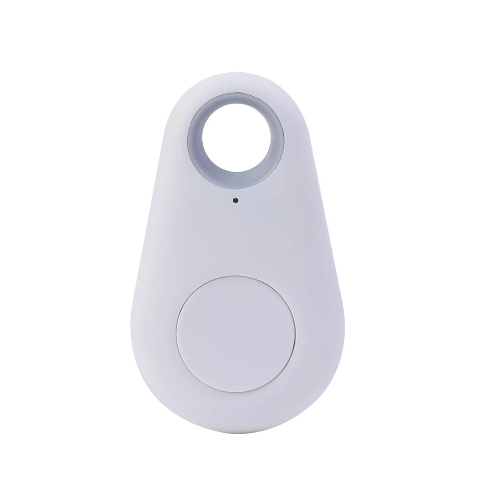 The Mini Smart Bluetooth Tracker - GPS Locator for Pets is small, white, and teardrop-shaped with a circular button in the center and a hole at the top for keyring or bag attachment, providing real-time tracking to keep valuables secure.