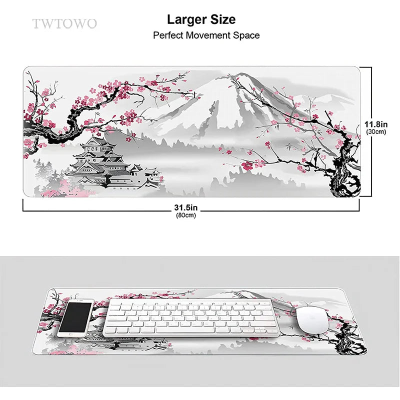 The TWTOWO Sakura XL Mouse Pad features a Japanese-inspired design with cherry blossoms, a pagoda, and mountains. Measuring 31.5x11.8 inches, this durable non-slip mat securely holds your keyboard, mouse, and smartphone in place.
