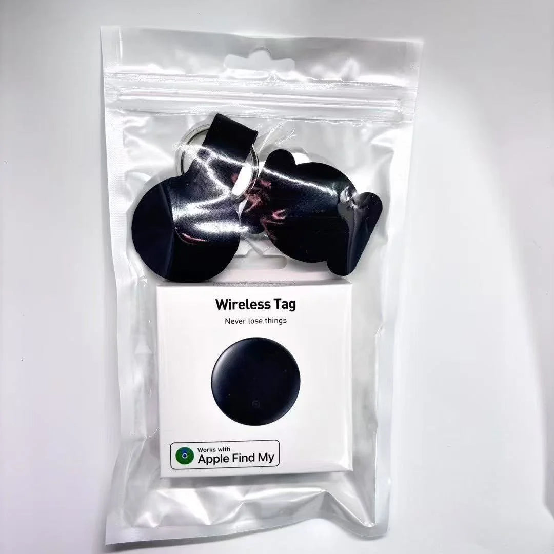 The NoEnName GPS Tracker - Bluetooth Locator for Pets comes in a clear plastic bag, with multiple black circular tags and a white box labeled Never lose things. It features the Find My App Locator for pinpoint accuracy and works with Apple Find My.