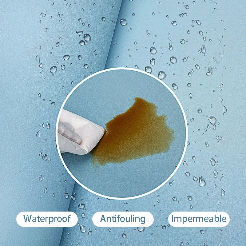 Close-up of a light blue AIPHY Large PU Leather Mouse Pad. A circular inset shows a hand wiping a brown liquid stain off the stylish waterproof surface. Words below: Waterproof, Antifouling, Impermeable.