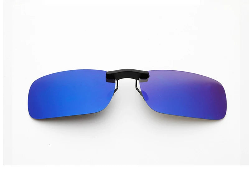 Close-up of Honey Joe blue-tinted rimless polarized clip-on sunglasses on a white background, featuring UV400 protection. The lenses are connected by a sleek black bridge, enhancing the minimalist design.