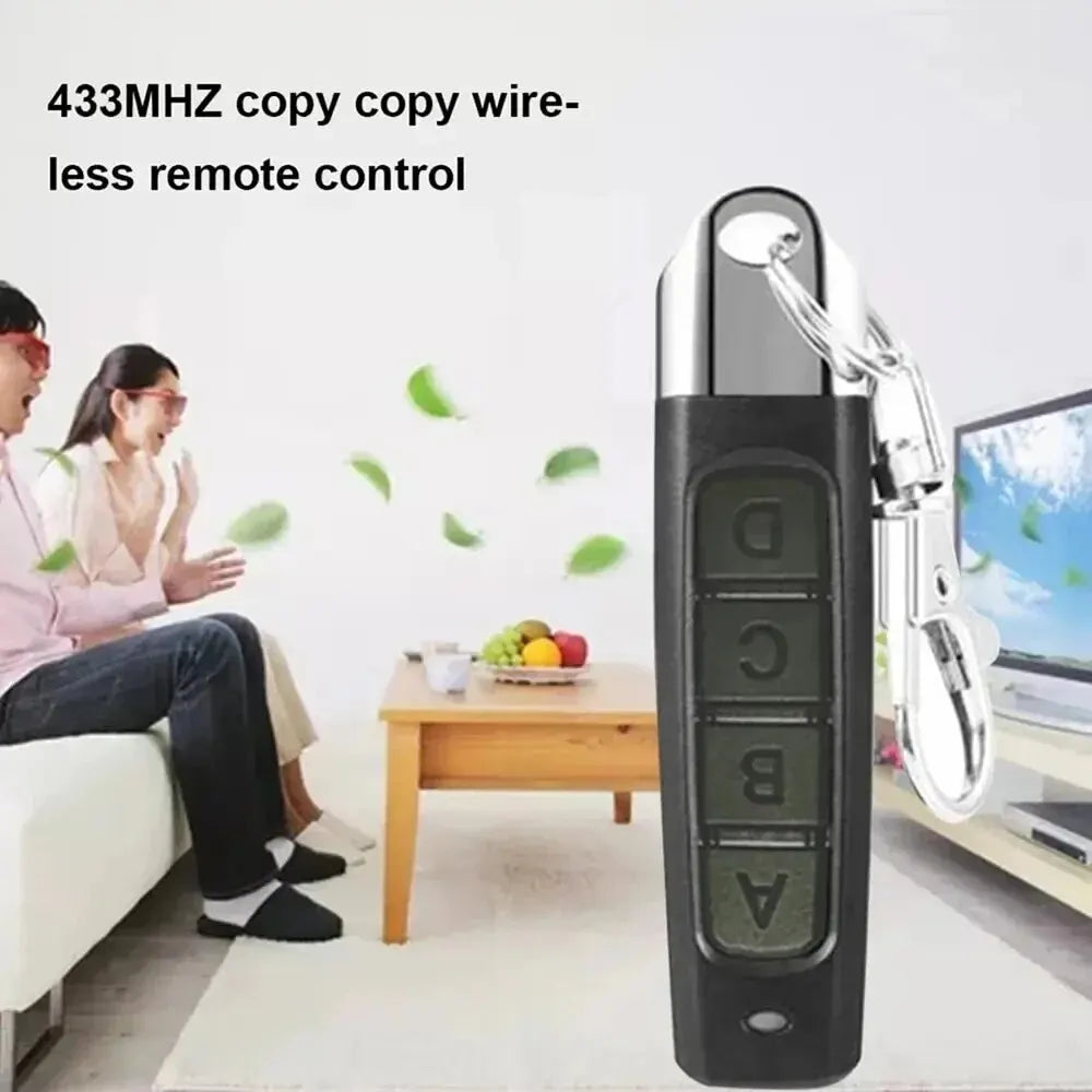 A close-up of the Universal 433MHz Wireless Remote Control For Garage Access with A, B, C, D buttons. In the background, a man and woman relax on a couch with leaves blowing and the TV on.