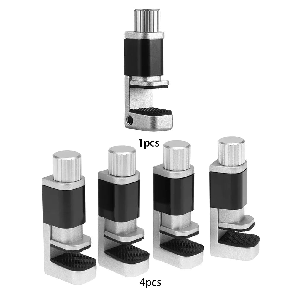 The MOJOYCE Adjustable Alloy Clamp set is ideal for accurate mobile repairs, featuring five desk clamps with a silver cylindrical handle, black center, and textured grip to securely hold objects. Perfect for precision tasks such as screen protection.