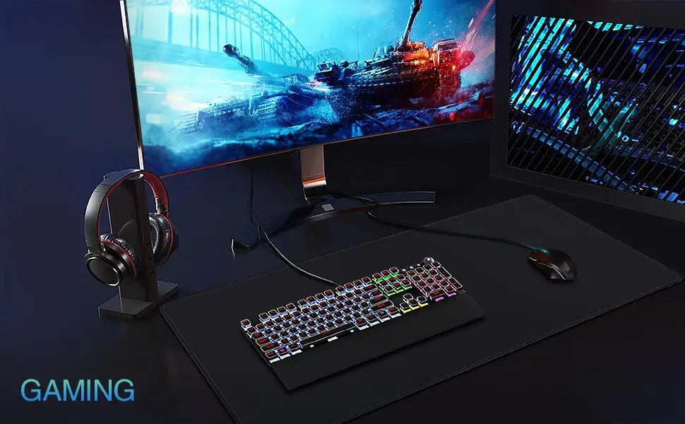 A gaming setup includes a monitor with a battleship scene, a colorful backlit keyboard and mouse placed on the Ziyoulang Large Mouse Pad 800x300mm with stitched edges, a headset on a stand, and GAMING visible at the bottom left.