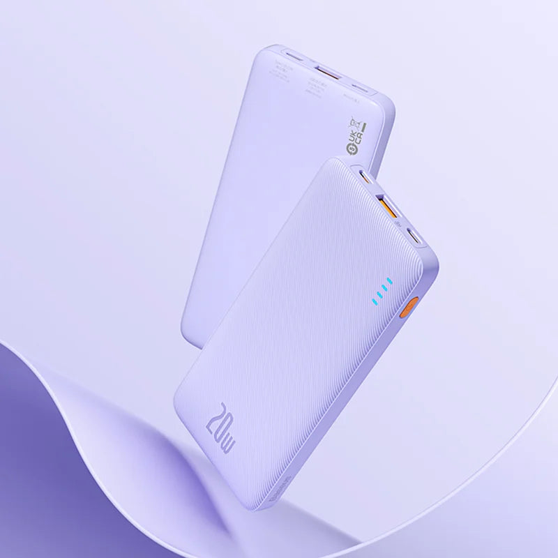 Two white Baseus Airpow 20W Power Banks, with minimalist designs, float against a light purple background. Featuring LED indicators and multiple ports, they offer fast charging with a robust 10000mAh capacity, reflecting a modern and sleek style.