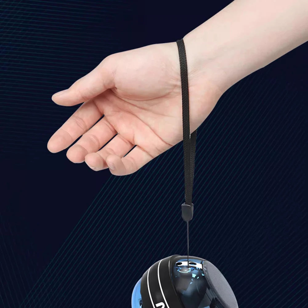 A hand holds a black strap of the Wrist Trainer Self-starting Gyro Ball for Strength, with a spherical camera look, against a dark backdrop with diagonal lines.