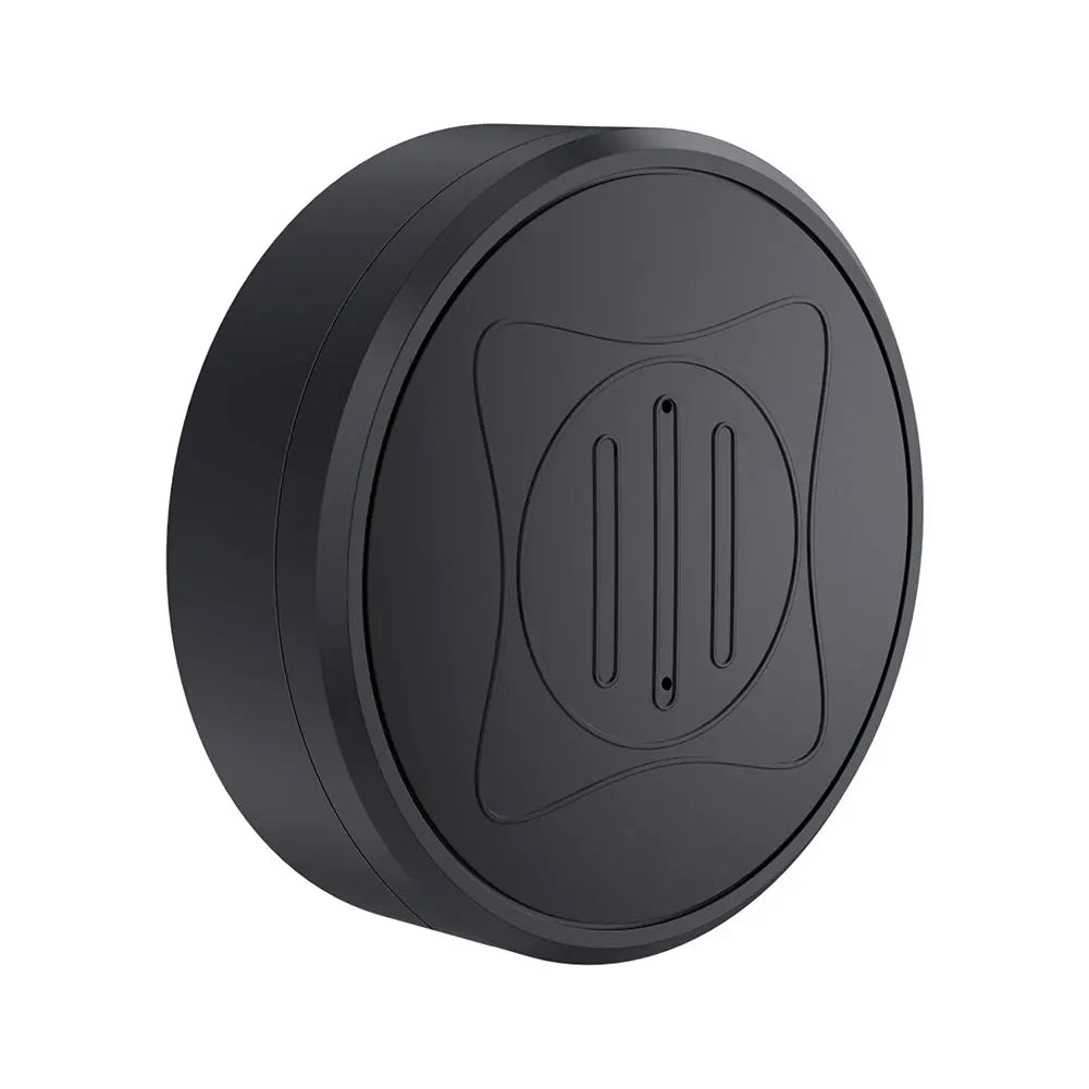 The Mini GPS Tracker - Real-Time Magnetic Smart Locator is a sleek, black charging pad with a round design and subtle groove pattern, offering wireless charging for compatible devices alongside real-time tracking capabilities.