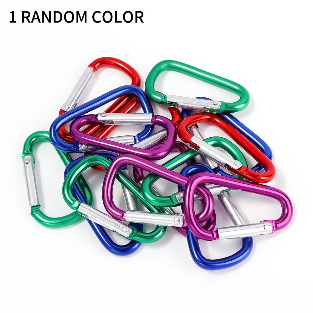 On a white background, assorted carabiners in red, green, blue, and purple are shown with the text 1 RANDOM COLOR above. Attach the Mini Smart Bluetooth Tracker - GPS Locator for Pets to track your gear and avoid losing it.