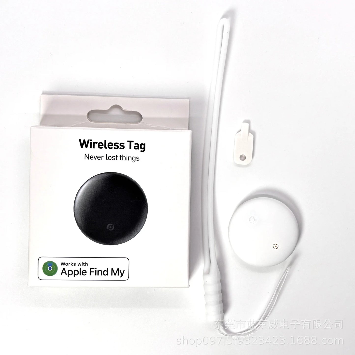 A round white NoEnName GPS Tracker - Bluetooth Locator for Pets sits beside its packaging, displaying a black image and the text Works with Apple Find My. Included are a white loop strap and attachment tool for seamless integration with the Find My App.