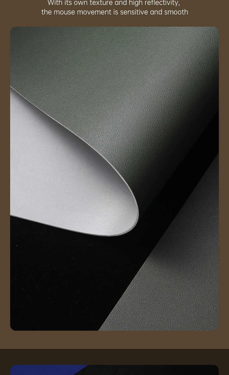 The Xummen Large Mouse Pad boasts a textured, smooth surface with a dark green top and light gray non-slip underside. This waterproof PU gaming desk mat slightly curls at the edges, highlighting its flexibility and two-tone design.
