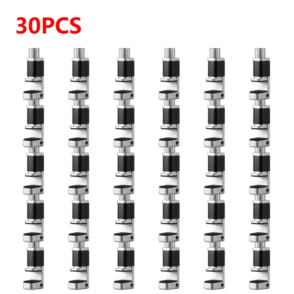 Vertical rows of silver and black camshafts are secured against a white background using MOJOYCE Adjustable Alloy Clamp for Secure Mobile Repairs, with bold red 30PCS text in the top left corner.