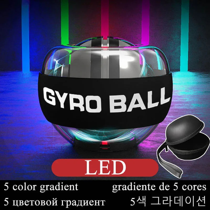 A transparent LED Gyro Wrist Force Handball glows with vibrant LED lights on a reflective surface. The words GYRO BALL are on a sleek black band, with multilingual text below revealing: 5 color gradient and LED Light-emitting, plus an image of a stylish black carrying case.