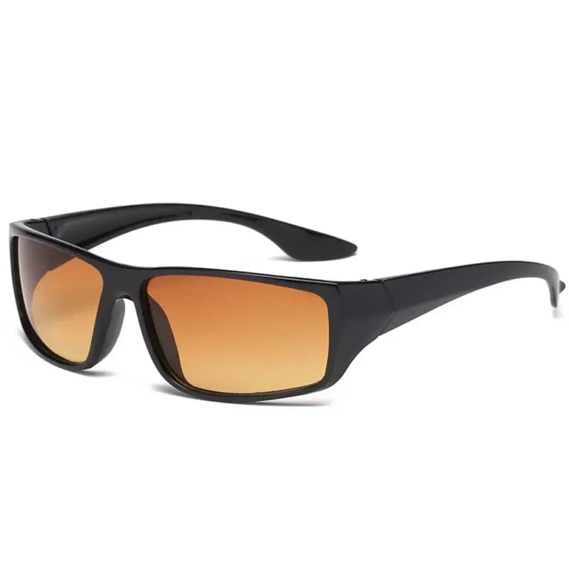 The anti-glare night vision goggles feature sleek, slightly curved black frames with large, rectangular orange-tinted lenses and offer UV400 protection. They provide a modern, sporty look for any adventure while ensuring clear visibility and eye protection.