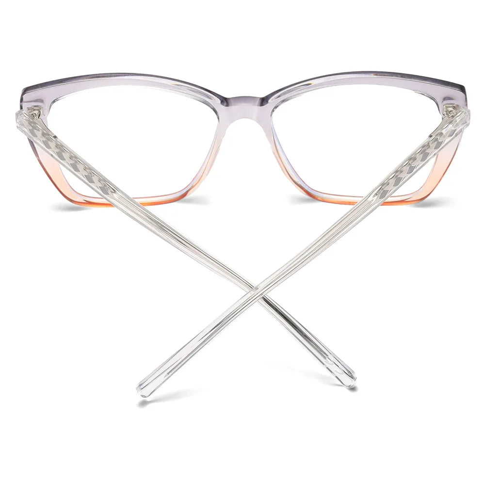 The AABV Womens Cat Eye Bifocal Reading Glasses feature a transparent frame with a cat eye hint and ombre lenses transitioning to orange. Textured temples cross in front, adding flair to these stylish reading essentials.