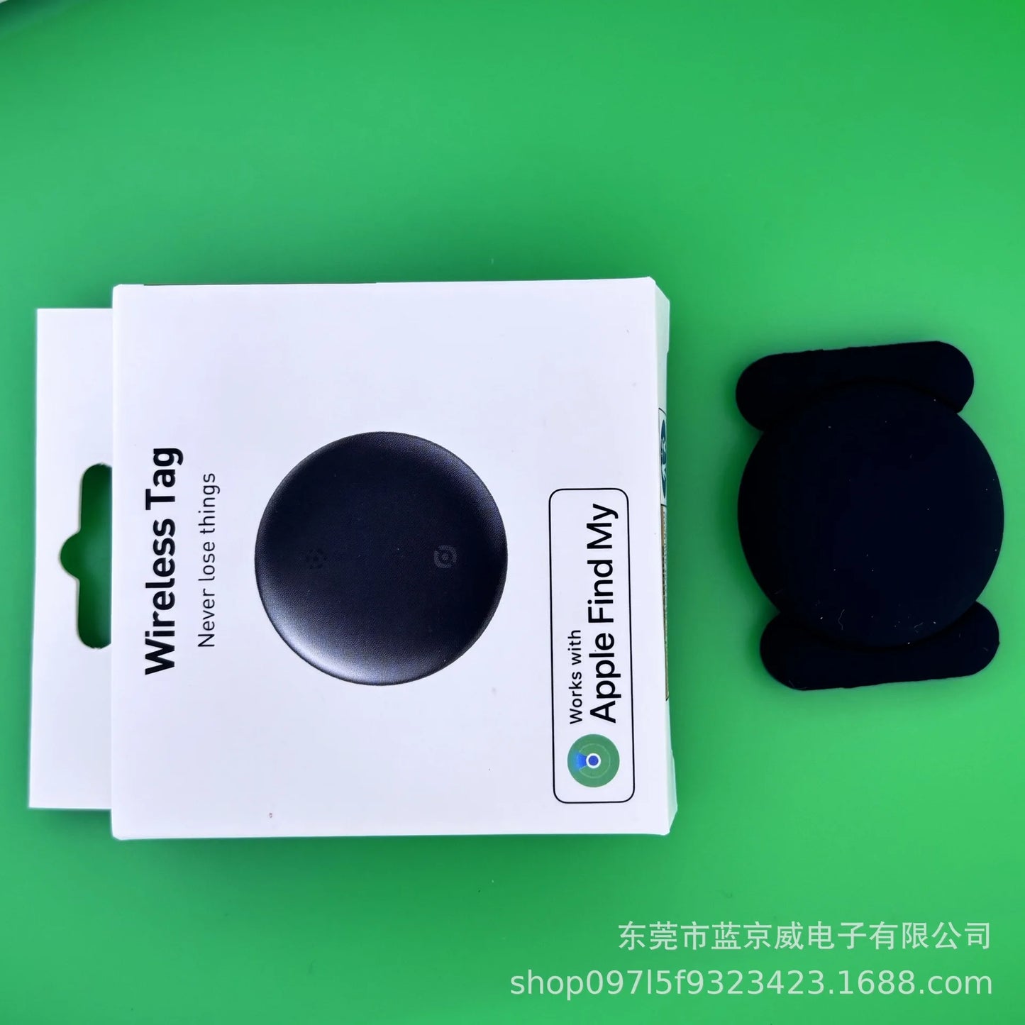 A green background highlights the wireless tag and packaging of the NoEnName GPS Tracker - Bluetooth Locator for Pets. The box says GPS Smart Tracker, Works with Apple Find My, ideal for the Find My App Locator. The black round tag has a small icon, with manufacturer info at the images bottom.