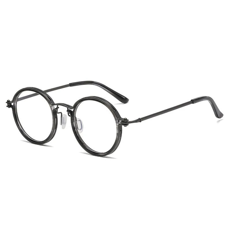 KLASSNUM Luxury Round Frame Reading Glasses - Anti Blue Light, featuring thin black rims and clear lenses, are displayed at an angle on a white background.