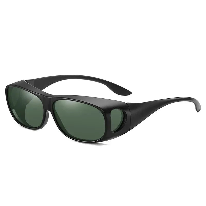 The MOKDUFF Polarized Sunglasses feature a sleek black wrap-around design with dark green lenses, side shields, and UV400 protection. Wide arms ensure extra coverage, while the modern and sporty style fits over glasses comfortably.