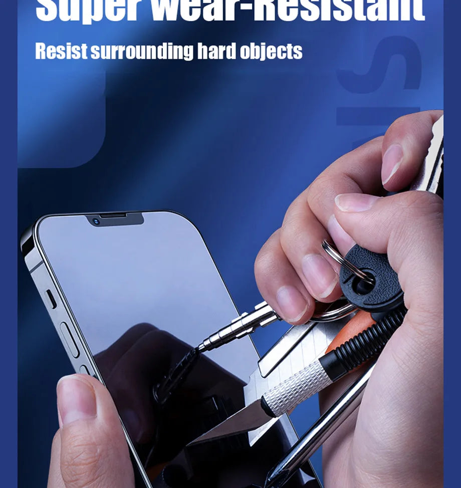 A hand holds a smartphone as another presses keys, a screwdriver, and a utility knife against the screen, showing the YKSPACE 2Pcs Anti Blue-Ray Tempered Glass Screen Protectors scratch resistance and eye care technology. Super wear-resistant.