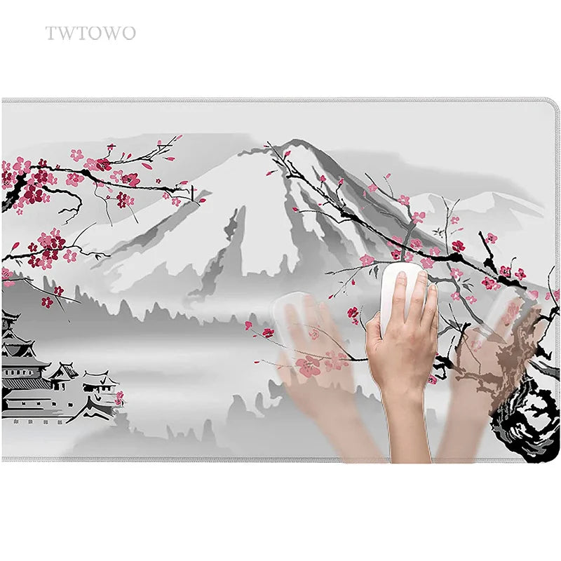 Enhance your workspace with the TWTOWO Sakura XL Mouse Pad. Its non-slip, durable, and features a traditional Japanese landscape with a snowy mountain, cherry blossoms, and a serene temple. Perfect for expansive setups, its easy to clean with just a cloth wipe.