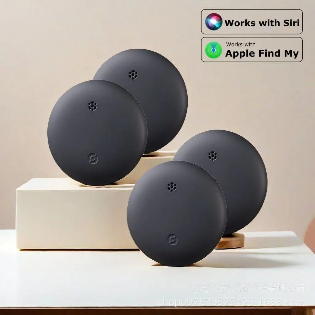 Four NoEnName GPS Trackers for pets, shown on a white and beige stand, feature compatibility logos for Siri and Apple Find My. The neutral background highlights the sleek design and precision tracking capabilities essential for locating anything you need.