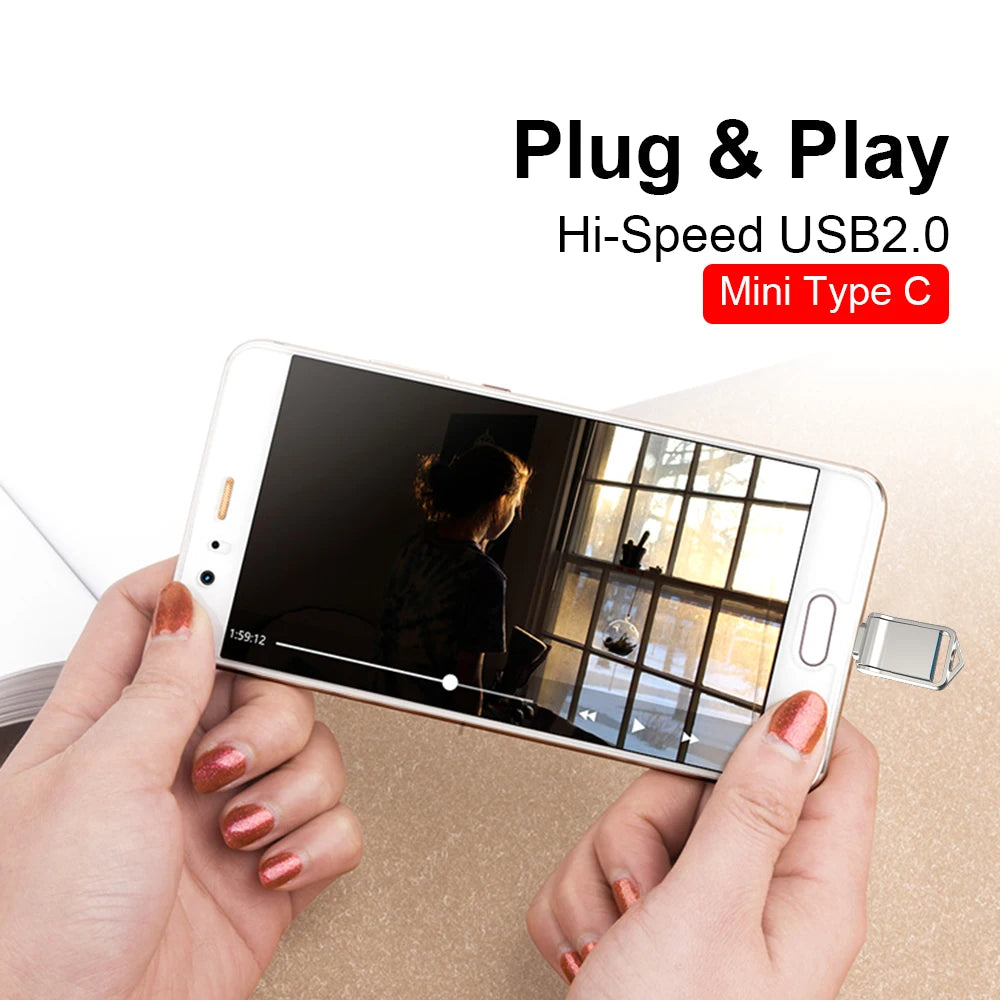 A person holds a smartphone with the MicroDrive Mini USB 2.0 Flash Drive plugged in. The phone shows a video of someone looking out a window, with text stating “Plug & Play Hi-Speed USB2.0 Mini Type C.” Available storage options are 64GB and 32GB.