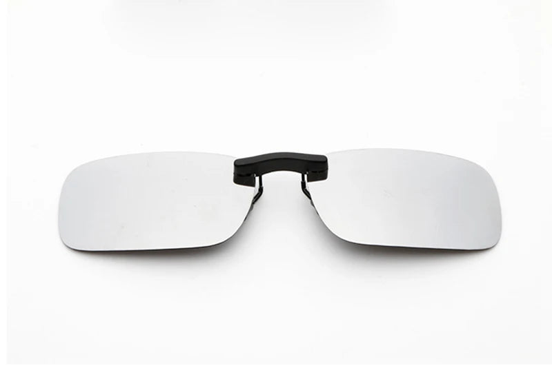 The Honey Joe Polarized Clip-On Sunglasses offer UV400 protection, featuring rimless rectangular lenses with a sleek black bridge, displayed against a white background.