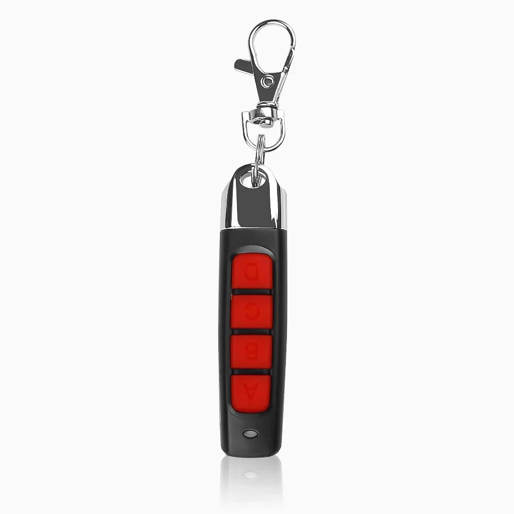 A black Universal 433MHz Wireless Remote Control For Garage Access with four red A/B/C/D buttons and a silver keychain clip, perfect for door and gate control, is displayed against a plain white background.