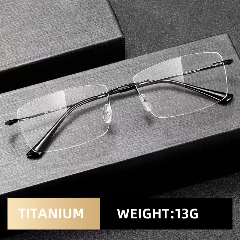 A pair of YINSQER Titanium Rimless Reading Glasses with black temples rests on a sleek black surface, crafted from titanium and weighing just 13 grams. These glasses feature scratch-resistant lenses for enduring clarity and block blue light.