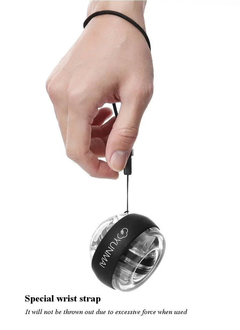A hand holds a transparent cylindrical device, the Xiaomi Forearm Exerciser LED Gyroball Trainer, featuring a black cap and wrist strap. The special wrist strap prevents it from being thrown out during vigorous use, making it an effective grip strength enhancer for dedicated athletes.