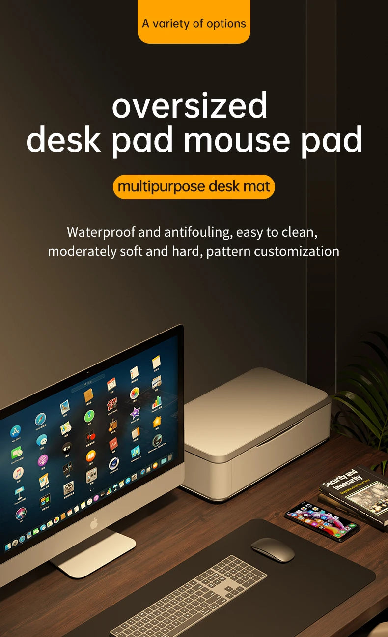 A workspace with a computer, keyboard, and mouse is set on an Xummen Large Mouse Pad - Waterproof PU Gaming Desk Mat featuring a non-slip base. Its antifouling, easy to clean, and customizable with various patterns. A multifunction printer completes this efficient setup.
