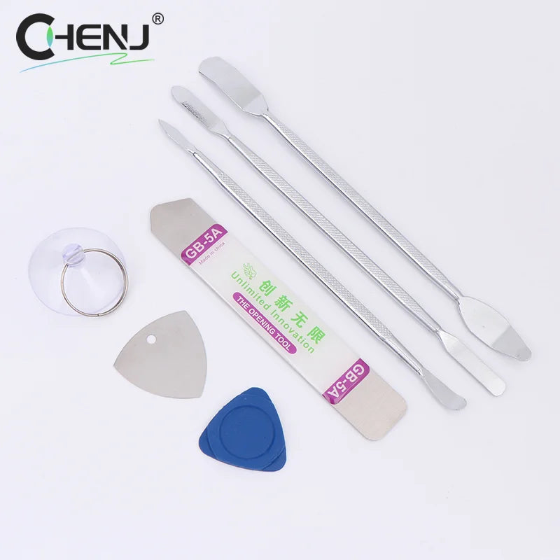 Check out the 7pcs Metal Spudger Kit for Easy Phone Repairs, featuring three silver spudgers, two guitar pick pry tools (gray and blue), a suction cup with ring, and a GB-5A folding tool—all on a clean white background. Enjoy free shipping!.