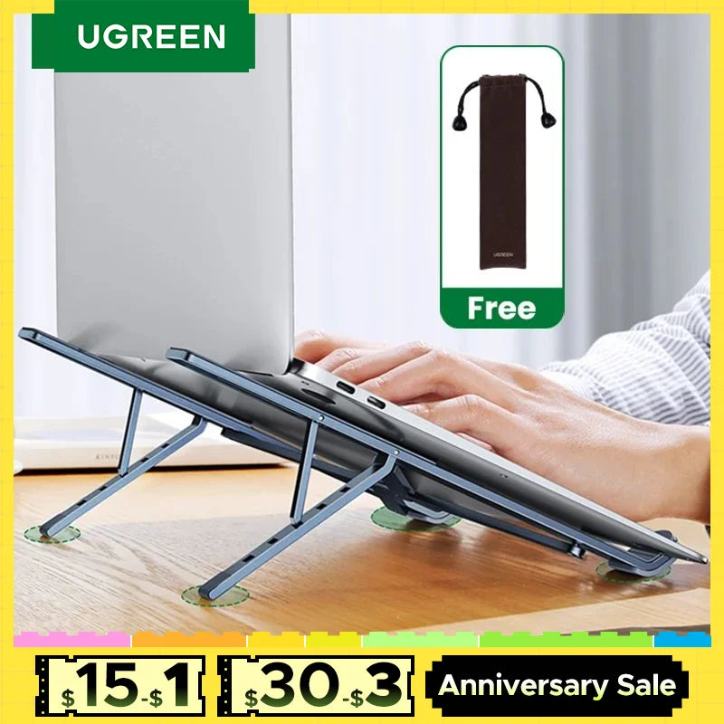 The UGREEN Laptop Stand - Adjustable Foldable Aluminum showcases hands typing on an ergonomic stand with adjustable angles. A free carrying bag is included. At the bottom, an anniversary sale banner displays prices of $15.1 and $30.3, topped with the UGREEN brand logo.