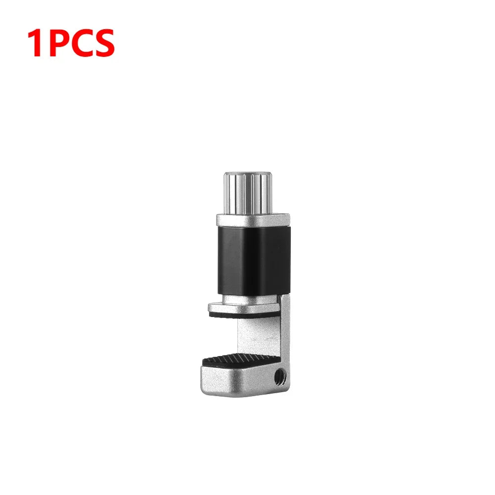 An isolated close-up highlights the MOJOYCE Adjustable Alloy Clamp for Secure Mobile Repairs, featuring a metal and black plastic design with a screw mechanism and ridged grip. Its set against a white background with red text 1PCS in the top left corner.