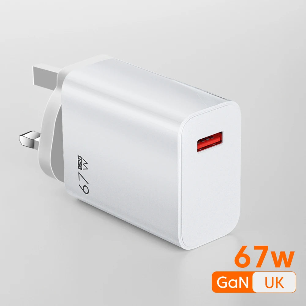 The 67W GaN USB Charger with Quick Charge 3.0 technology is white, has a red USB port for efficient charging, and comes with a UK three-pin plug.