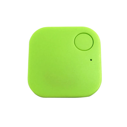 This compact, square, green Smart Bluetooth 4.0 Anti-Lost Tracker for Valuables has rounded corners, a circular button on the top right, and a tiny dot below possibly indicating a light or sensor. Ideal for tracking keys or pets.