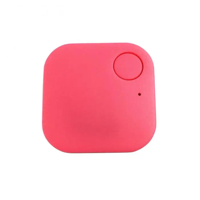 A compact red Smart Bluetooth 4.0 Anti-Lost Tracker for Valuables with rounded corners, a circular indentation, and a small dot—ideal for tracking keys or pets.