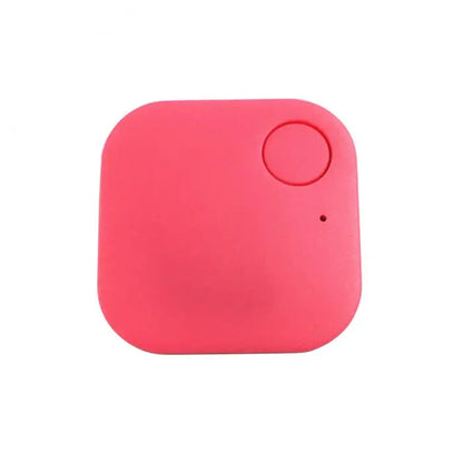 A compact red Smart Bluetooth 4.0 Anti-Lost Tracker for Valuables with rounded corners, a circular indentation, and a small dot—ideal for tracking keys or pets.