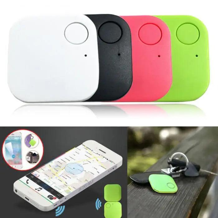 Four Smart Bluetooth 4.0 Anti-Lost Trackers for Valuables in white, black, pink, and green are displayed alongside a smartphone image showing a map location and a tracker on a keychain on wood—ideal for tracking keys or pets.