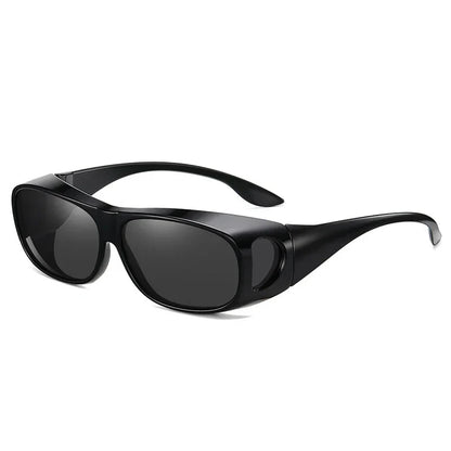 The MOKDUFF Polarized Sunglasses offer a sleek black wraparound design with wide arms and polarized lenses, providing UV400 protection for full eye coverage and a modern look.