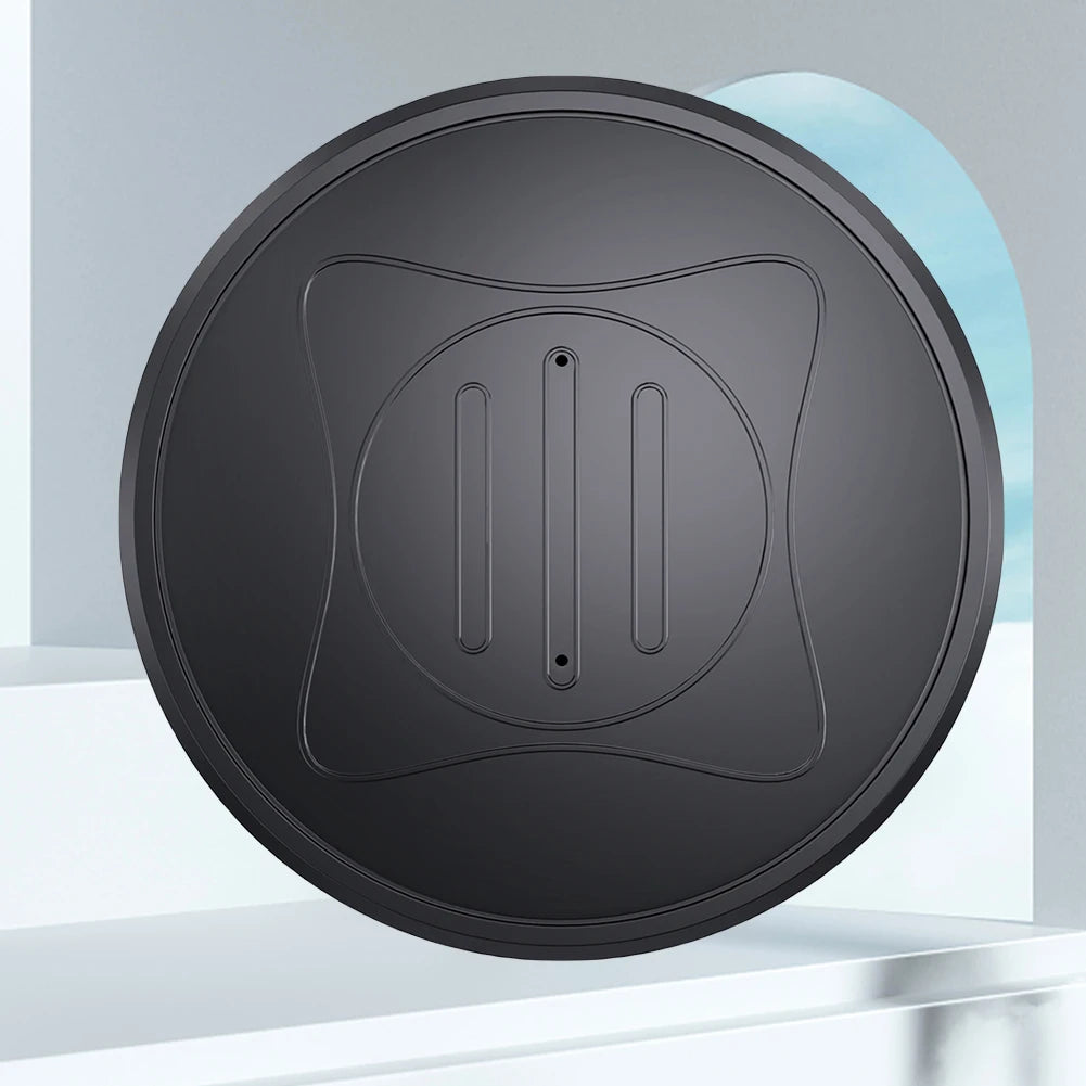 The Mini GPS Tracker - Real-Time Magnetic Smart Locator is a black circle with a minimalist abstract pattern of two parallel lines and a central hole, mounted on an arch-filled, light-colored background that subtly hints at real-time tracking.