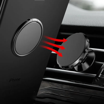 The Luxury Metal 360° Rotation Mobile Phone Ring Holder is shown attached to a smartphone and car air vent, offering optimal viewing. Red arrows highlight the magnetic connection between the phone and holder, set against a car dashboard backdrop.