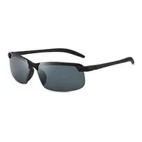 The HARKO Polarized Night Vision Cycling Sunglasses offer a sleek, modern design with black frames, dark lenses, and a semi-rimless frame with angled temples, ideal for stylish outdoor adventures.